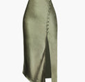 a green leather skirt with a side slit