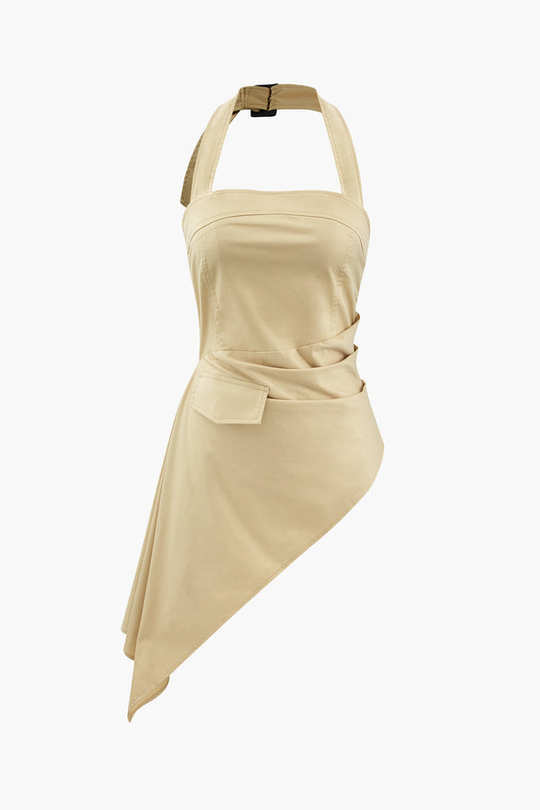 a woman is wearing a beige dress with a bow