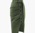 a green skirt with buttons on the side