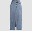 a woman is wearing a denim skirt with a slit
