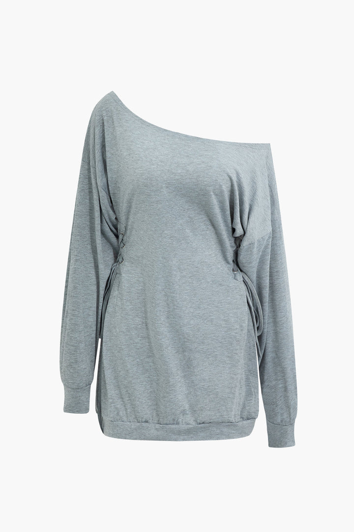 a grey sweater with a long sleeve and an open shoulder