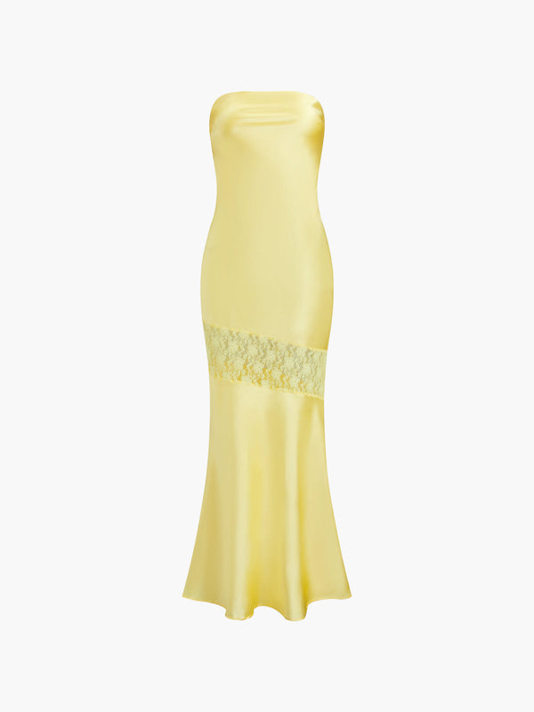 a woman in a yellow dress