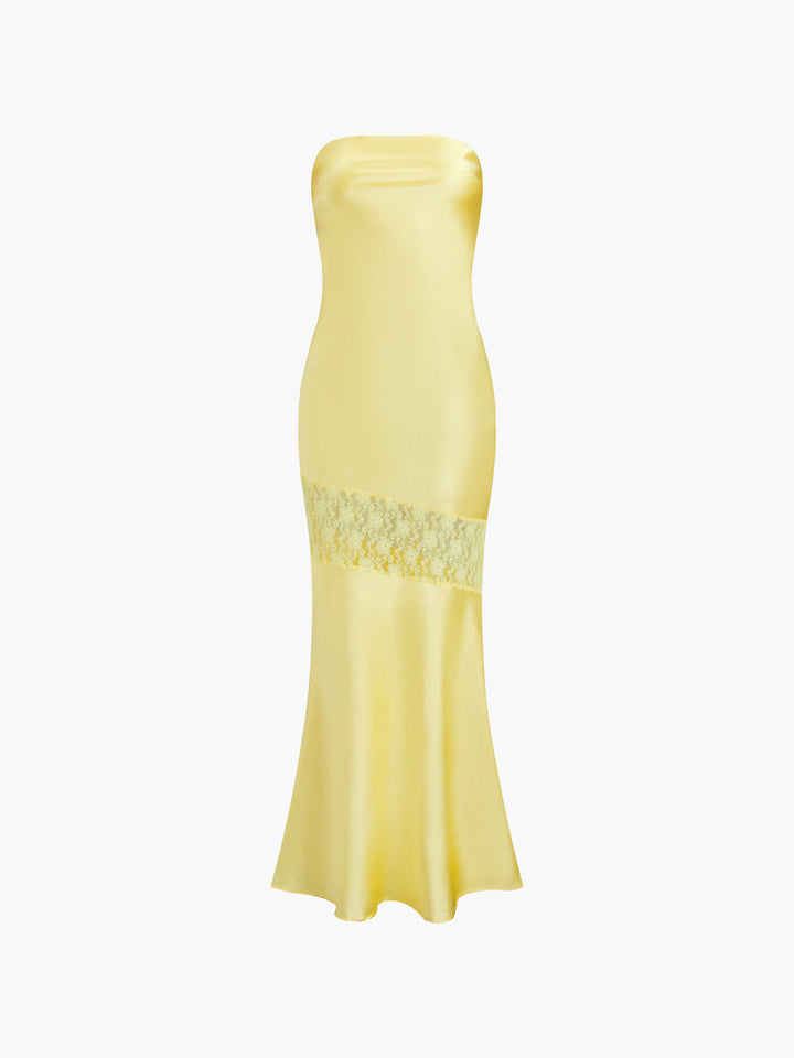 a woman in a yellow dress