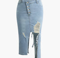 a woman ' s denim skirt with a torn knee