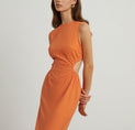 a model in an orange dress