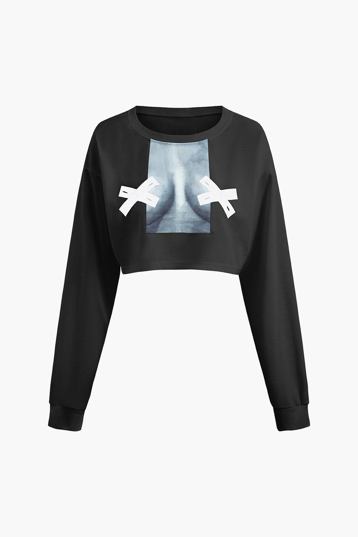 a cropped crop top with an image of a woman ' s face