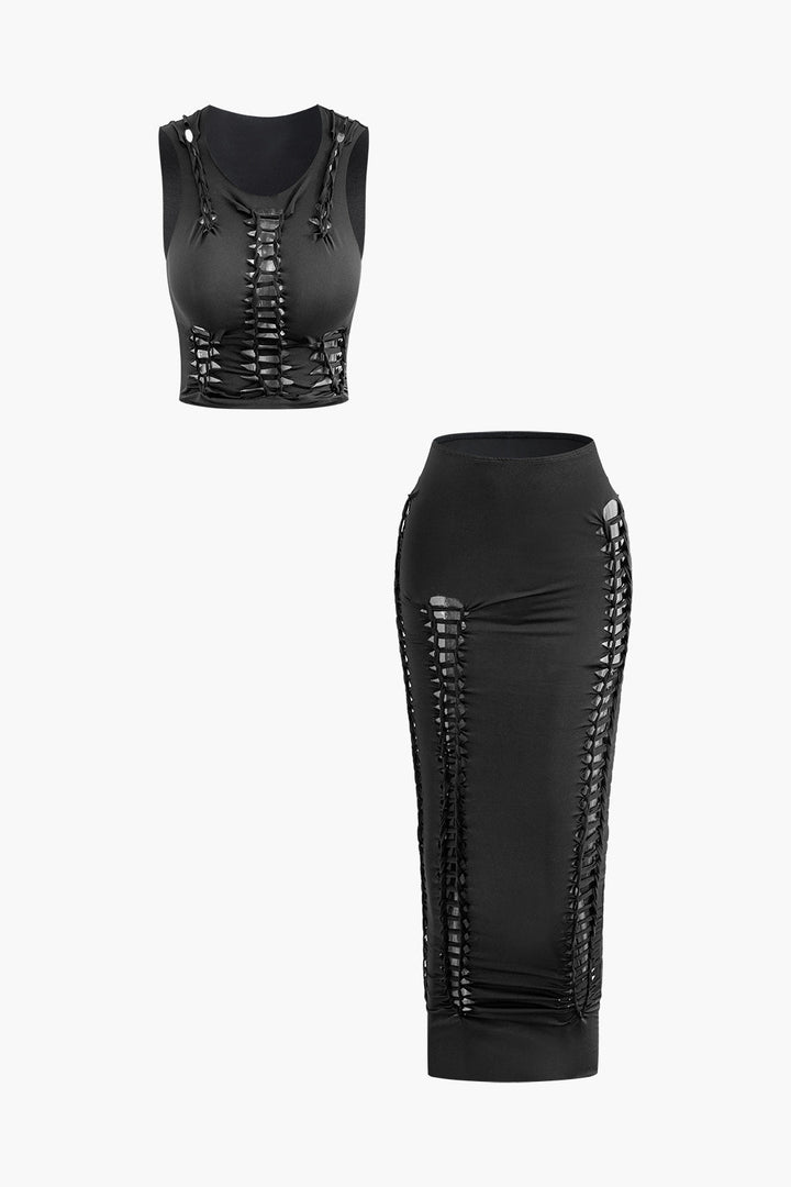 a woman wearing a black top and skirt