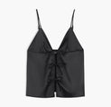a black crop top with a bow at the front