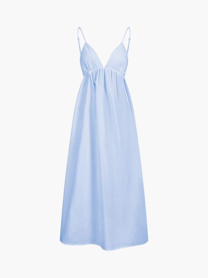 a light blue dress with spaghetti straps