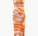 a dress with an orange and white camouflage print