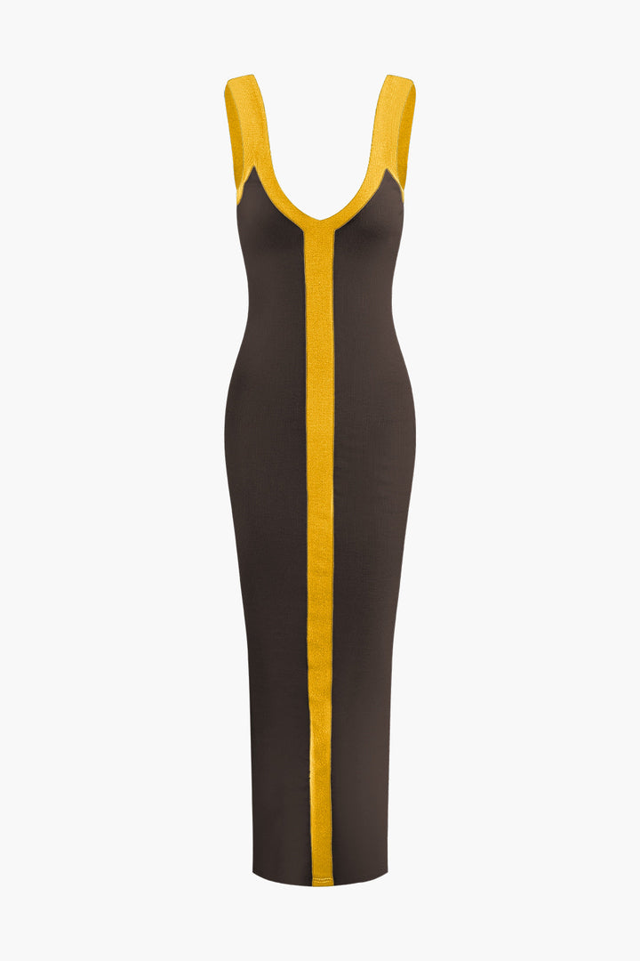 a woman in a brown and yellow dress