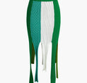 a green and white cable knit skirt