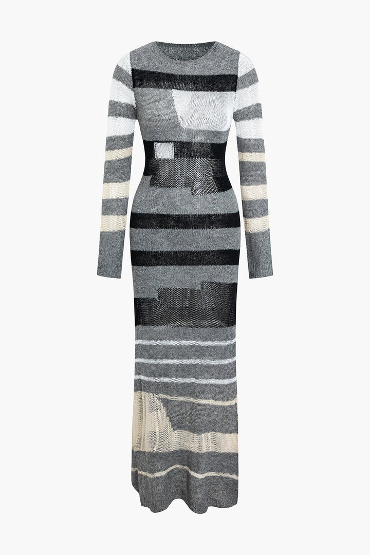 a woman in a grey and black striped dress