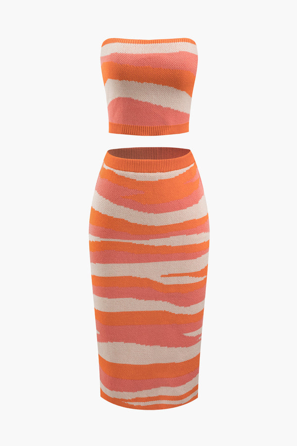 a women ' s orange and white striped dress