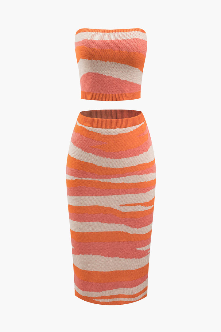 a women ' s orange and white striped dress