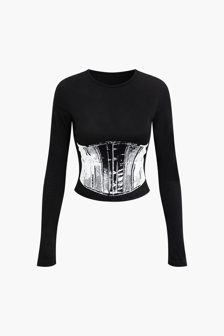 a black cropped top with a black and white print