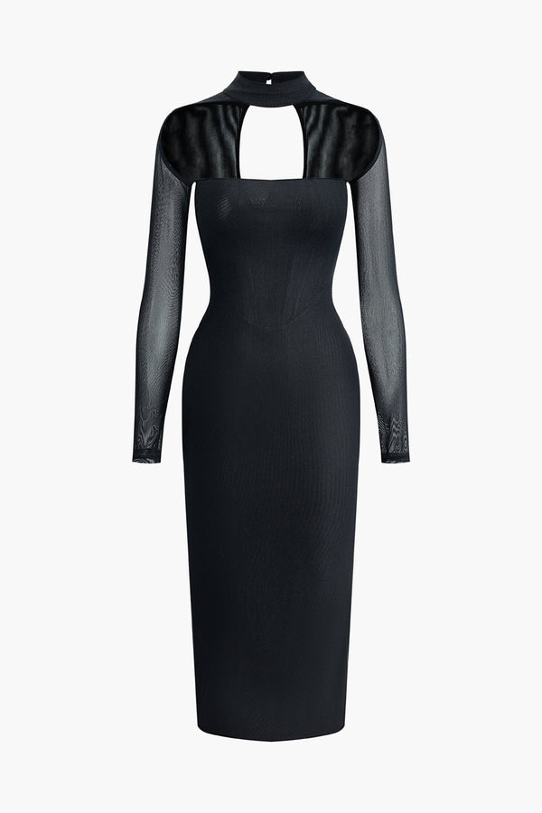 a black dress with long sleeves and a cutout