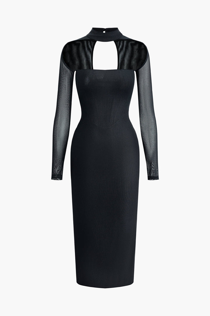 a black dress with long sleeves and a cutout