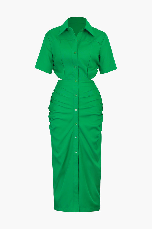 a green dress with short sleeves and buttons