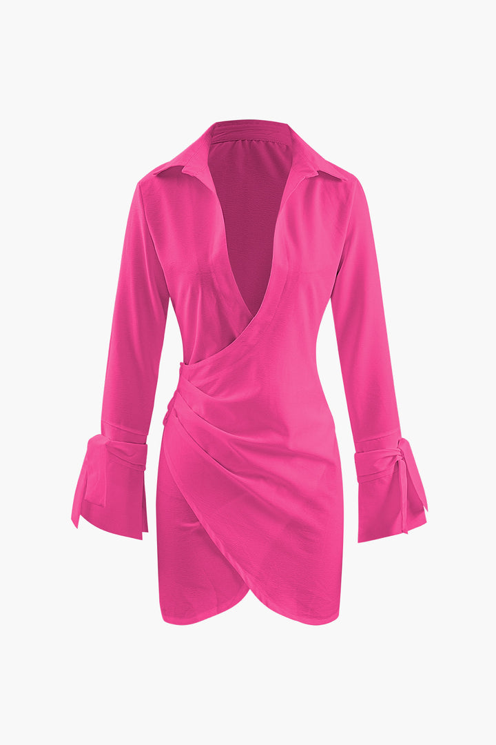 a woman wearing a pink top with a wrap around the back