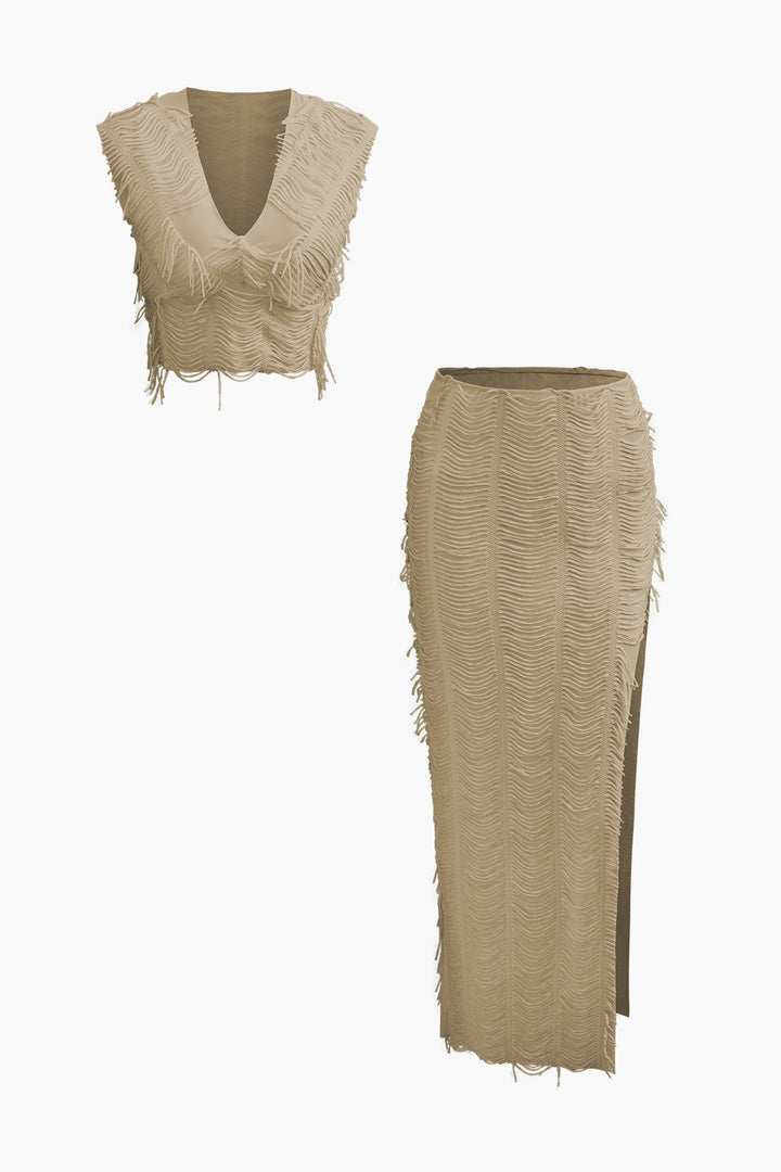 a beige skirt with fringes on the bottom and bottom