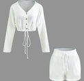 a white cropped top and shorts set