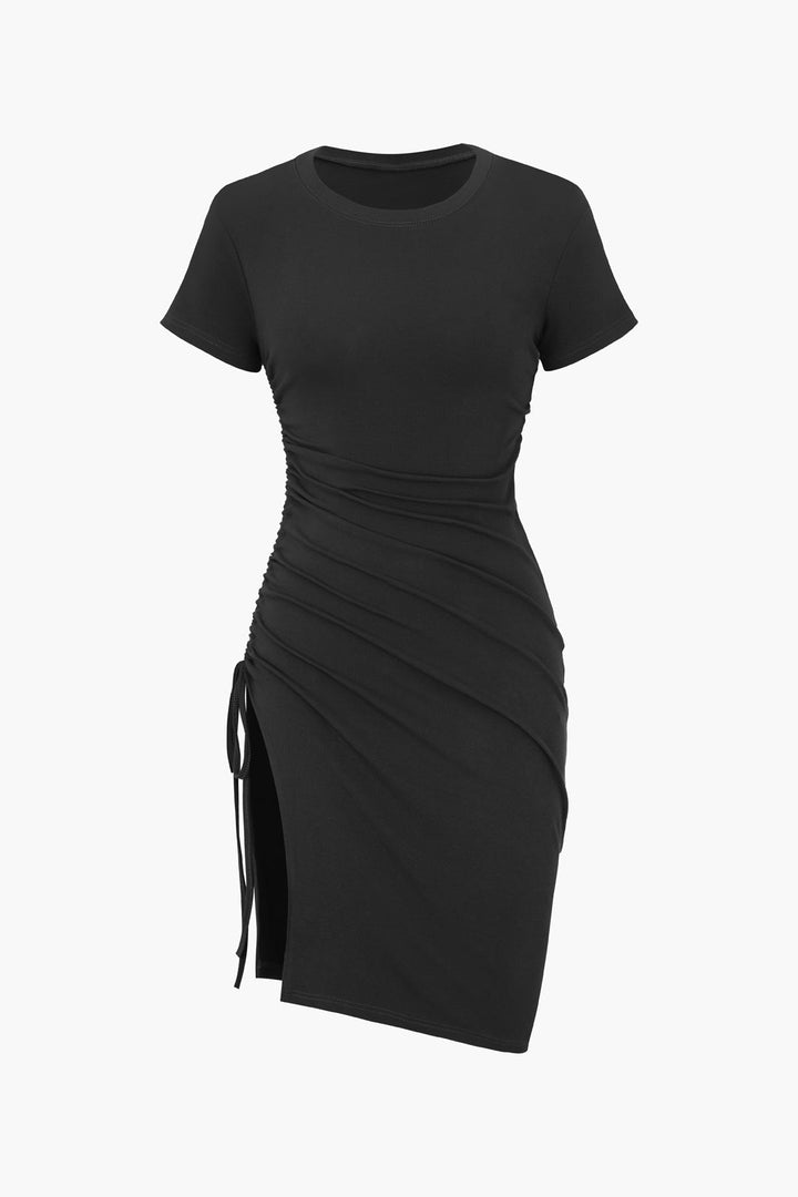 a black dress with a tie around the waist