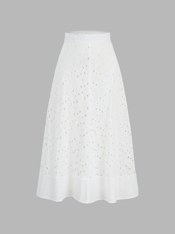 a white skirt with a cut out design
