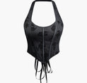 a black corset with a black floral design on it