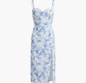 a white and blue floral print dress