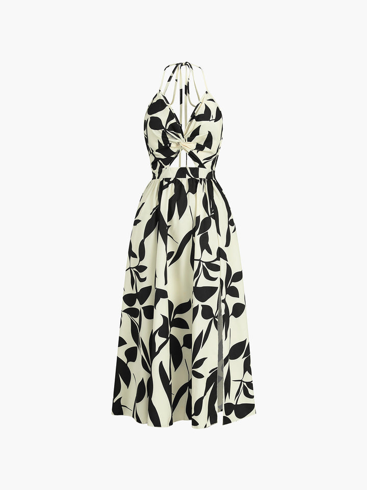 a black and white dress with leaves on it