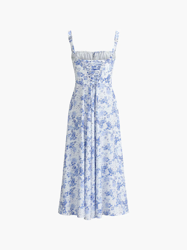 a white and blue floral print dress