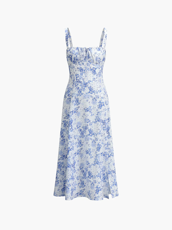 a white dress with blue flowers on it
