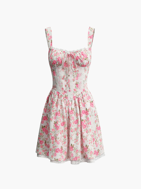 a white dress with pink flowers on it