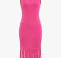a pink dress with fringes on the sides