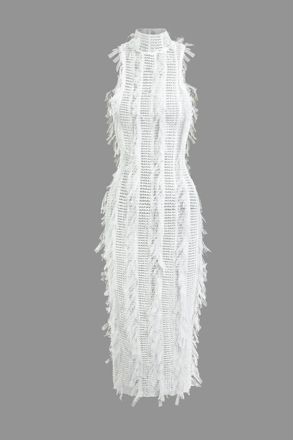 a white dress with feathers on it