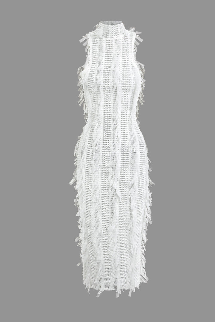 a white dress with feathers on it