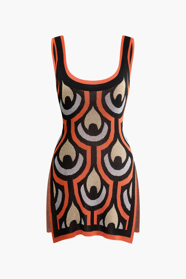 a black and orange dress with a pattern on it