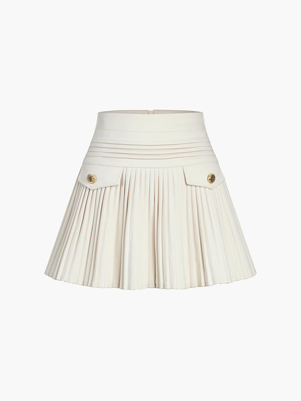 a white plea skirt with buttons and buttons
