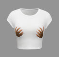 a white crop top with two hands on it