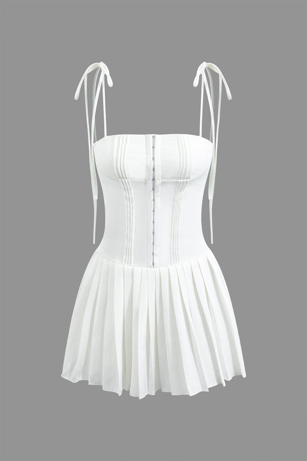 a white corset with straps and a white corset
