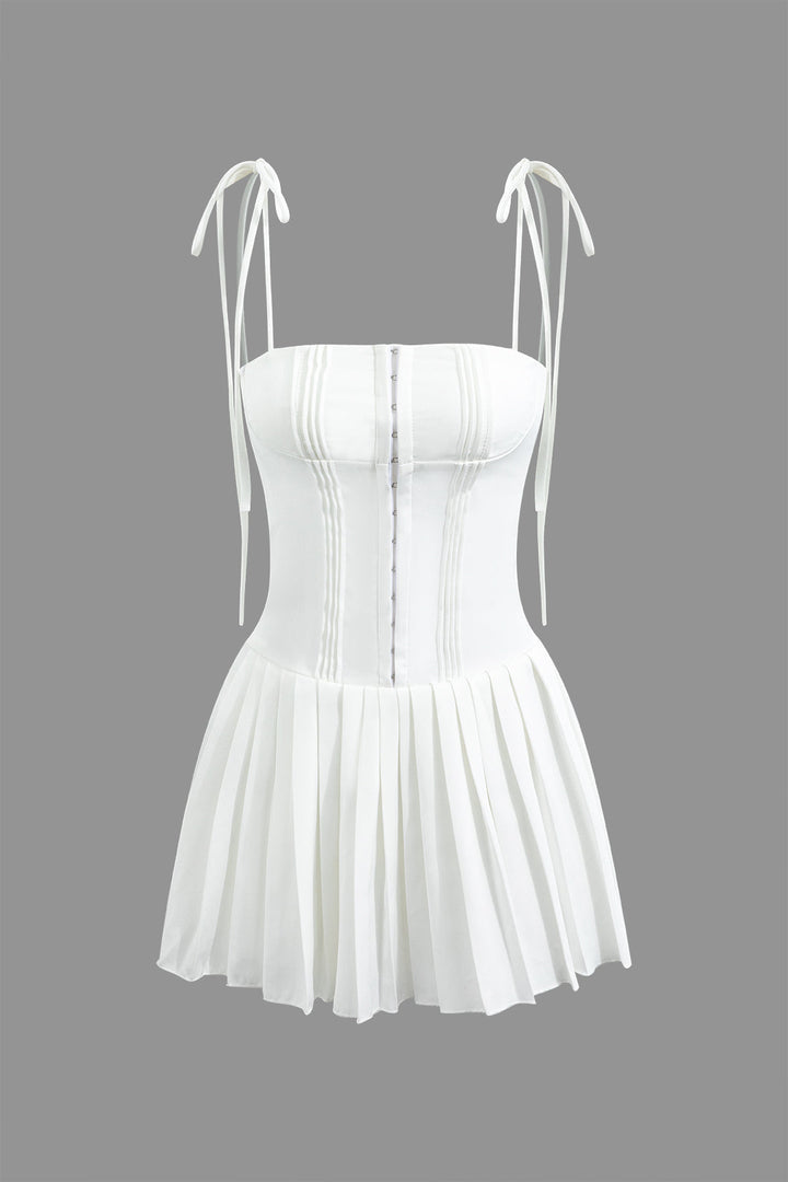 a white corset with straps and a white corset