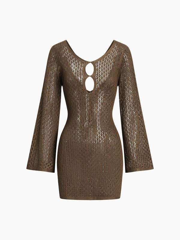 a brown dress with a cut out back and long sleeves