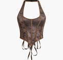 the back of a brown and black leather corset