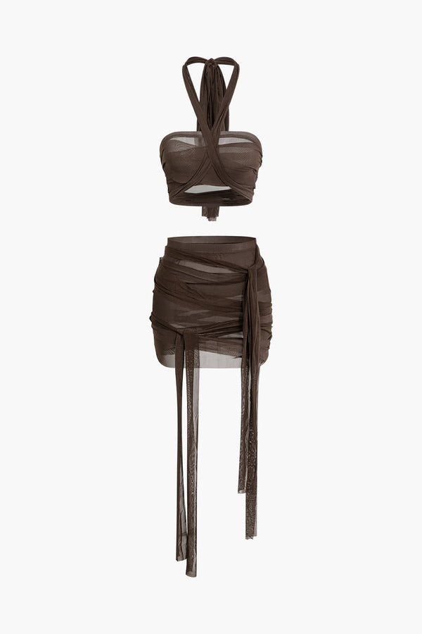 a brown top and skirt on a white background