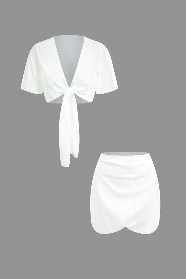 a pair of white shorts and a white top