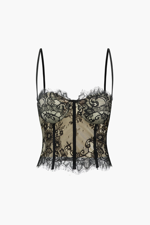 a black and white corset with black lace