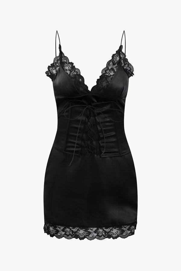 a black dress with lace detailing on the front