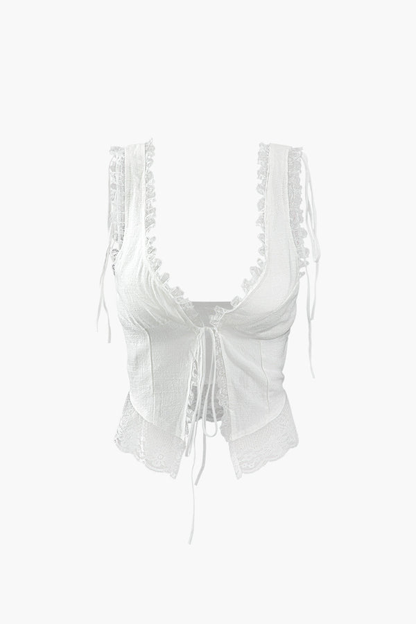 a white bra top with lace detailing