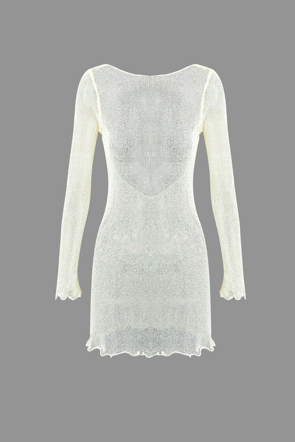 a white dress with long sleeves and long sleeves